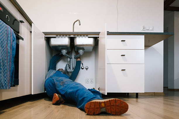 Professional Drain Cleaning technician working in Cushing, TX